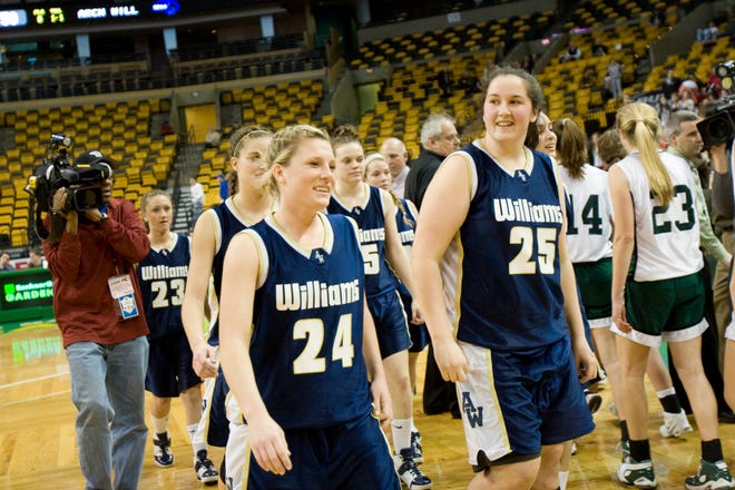 Christine Duffy and Alex Knowles walk off the court following Archbishop Williams' Div. 3 state semifinal game against Pentucket.
