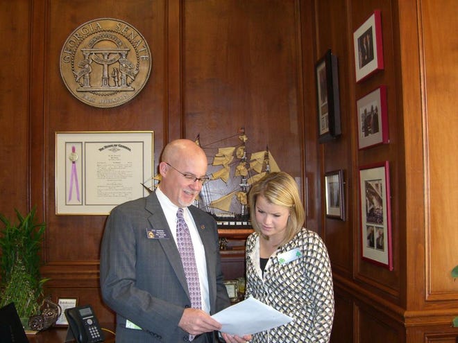 State Sen. Eric Johnson and legislative intern Lauren Moore of Savannah.