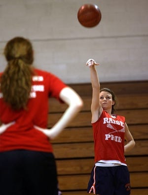 Sarah Grant shows off her form during practice yesterday.