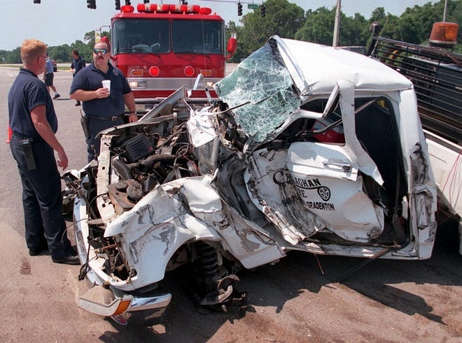The driver of this pickup, which collided with a tractor-trailer, was charged with running a red light. Preventing such collisions, and traffic deaths, is the purpose behind the installation of red-light cameras.