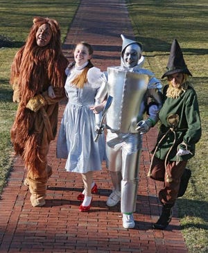Barnstable High School Drama Club’s “The Wizard of Oz” features, from left, Matt Kohler as the Cowardly Lion, Kelly Mosher as Dorothy, Shane Harris as the Tin Man and Ethan Brown as the Scarecrow.