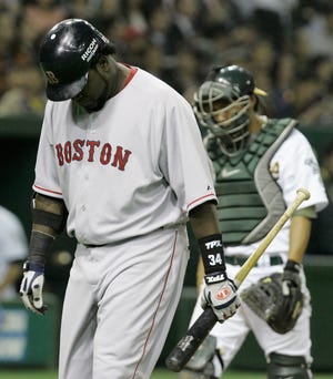 David Ortiz hangs his head after striking out against A's starter Rich Harden.