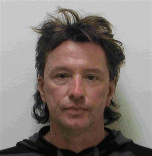 This police booking photo released by Laguna Beach, Calif., Police Department on Wednesday, March 26, 2008, shows Bon Jovi lead guitarist Richie Sambora after being arrested for suspicion of driving under the influence of alcohol.