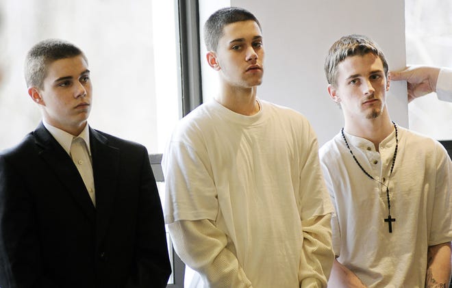 Three suspects charged with assault in the case of a man who was beat up at McDonald's in Milford, appear in Milford District Court. From left, are Michael Boudreau, Michael Prior and Alan Spear.