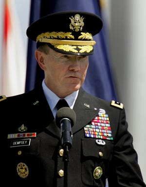 Army Lt. Gen. Martin Dempsey, above, replaced Navy Adm. William J. Fallon, below, as commander at Central Command, giving Dempsey responsibility for the Iraq and Afghanistan wars. The ceremony Friday is seen at left.
 ASSOCIATED PRESS / 
 CHRIS O'MEARA