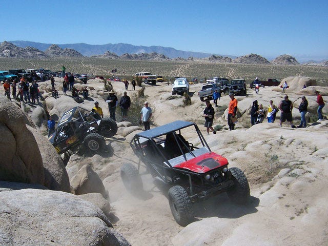 A competitor receives assistance after getting stuck on the course during the Pro Rock Event held in Johnson Valley just outside of Lucerne Valley. The event continues today at 9:00 am. For information please visit www.sportsintherough.com.
