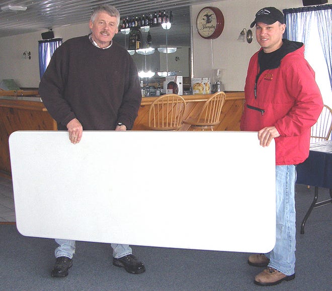 THE HOLLAND HEIGHTS GOLF COURSE in Herkimer is hosting its third annual golf equipment sale, scheduled for Sunday, April 13, from 11 a.m.- 4 p.m., to benefit the Herkimer County Humane Society. The sale is coordinated by Steve Morse, left, and golf course owner Ron deJong, setting up for donations and the event.