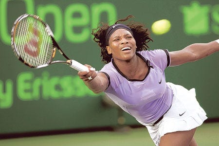 SERENA WILLIAMS <0x00A0>reaches for a return in her third-round match against Flavia Pennetta on Sunday, in which Williams committed 60 unforced errors and needed three sets to advance, 6-7 (6), 6-3, 6-2.