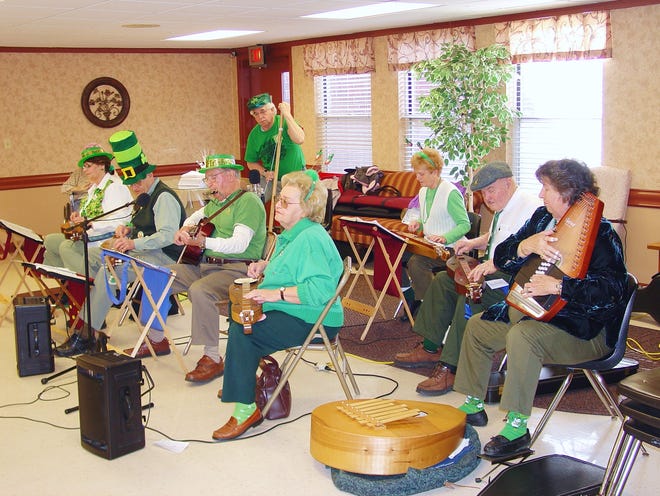 PHOTO submitted
Members of The Dulcimers ’n Such made a great impression with delighted residents and guests at Meadow Wind Health Center in Massillon on St. Patrick’s Day. Performing are: front row, from left, Linda Pack, David Halter, Ray Halter, Bobbi Finley; back row, from left, Bob Pack, Pat Halter, Clayton Welch and Dorothy Welch.