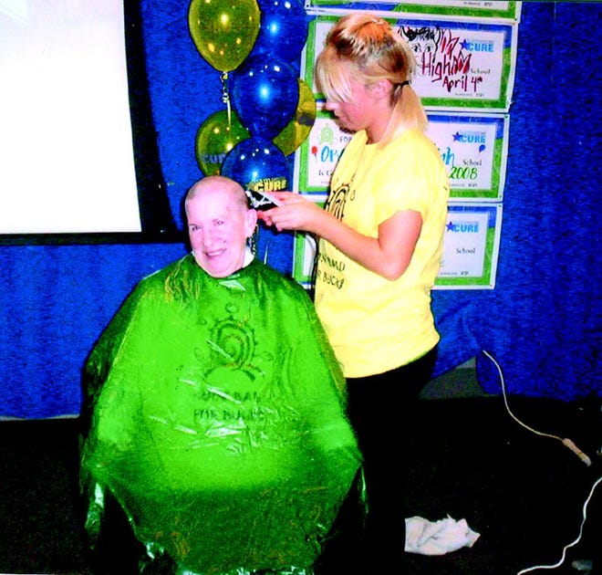 Geraldine Randall of Irondequoit didn’t mind “going bald” this year, since it meant she was fund-raising for Roswell Park Cancer Institute. Here, she has her head shaved in early March, at the beginning of the Goin’ Bald for Bucks campaign.