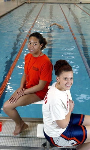Danielle Alarcon . right, and Jennifer Martinez, lifeguards/water safety instructors at SUNY Orange in Middletown pool on 3-21-08.