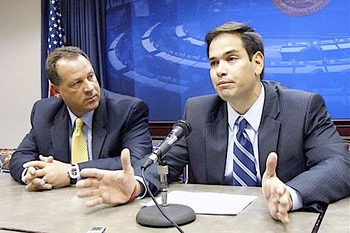 Florida House Speaker Marco Rubio fields a question at a news conference on Florida's economic and budget plight in this March 11 file photo, as House budget chief Ray Sansom, R-Fort Walton Beach, left, listens.