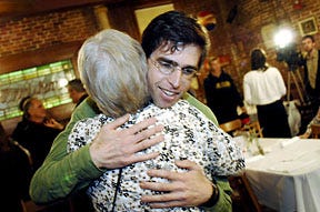 Above, First Ward City Councilman-elect Paul Sturtz hugs Linda Rootes, a supporter and North Central Columbia Neighborhood Association president, after his acceptance speech last night at the Pasta Factory. Below, Mayor Darwin Hindman, left, and wife Axie greet First Ward Councilwoman Almeta Crayton at her party last night at Boone Tavern. Crayton lost her re-election bid to Paul Sturtz. Â?Â  SLIDE SHOW: Election Night