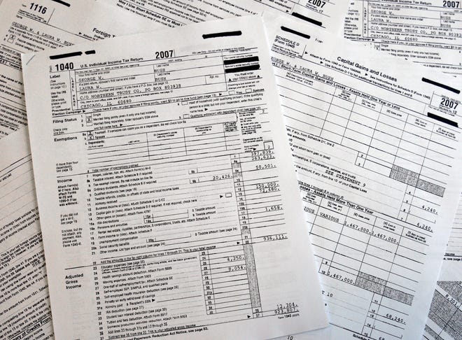These handout images provided to The Associated Press by the White House shows President and Mrs. Bush's 2007 federal income tax forms.