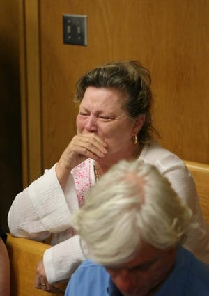 Mary Nichols, the grandmother of defendant Mercades Nichols, cries Friday in a courtroom in Bartow.