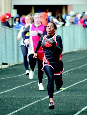 Massillon’s Sommher James coasts to a win during her 200-meter dash semifinal Saturday at the East Canton Invitational.