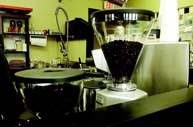Coffee beans are ready for grinding at the cafe.