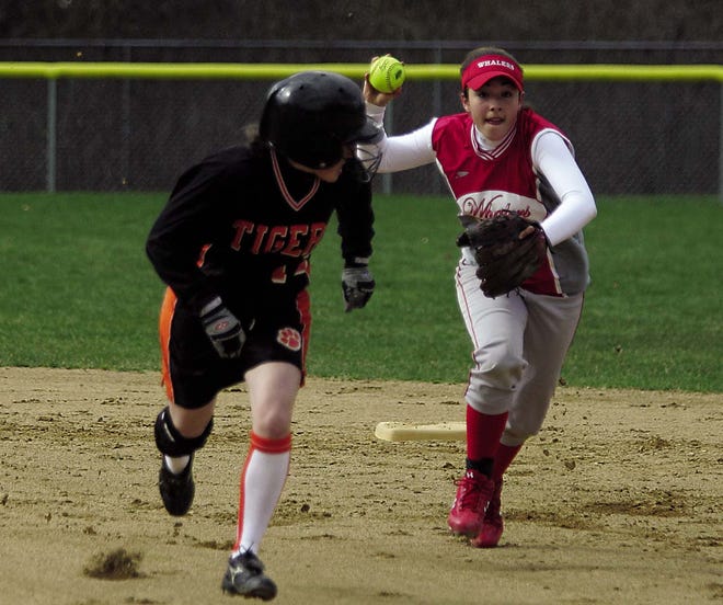 Taunton's Shanon Duffy is involved in a pickle during a four run outburst by the Tigers. Duffy had three hits and drove in two runs.