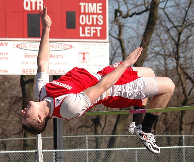 Northwest's Tony Stover clears the bar during the high jump competition at Northwest.