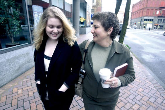 Lila Woloshin, left, walks with her mother Mara in downtown Portland, Ore., last week. Like many of the nation’s high school students, Woloshin is finding that summer jobs are scarcer this year as the U.S. economy slows amid rising oil prices, the housing crunch and tight credit market conditions.