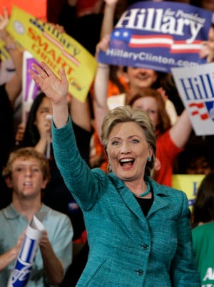Sen. Hillary Rodham Clinton, D-N.Y., waves to supporters Tuesday in Philadelphia.