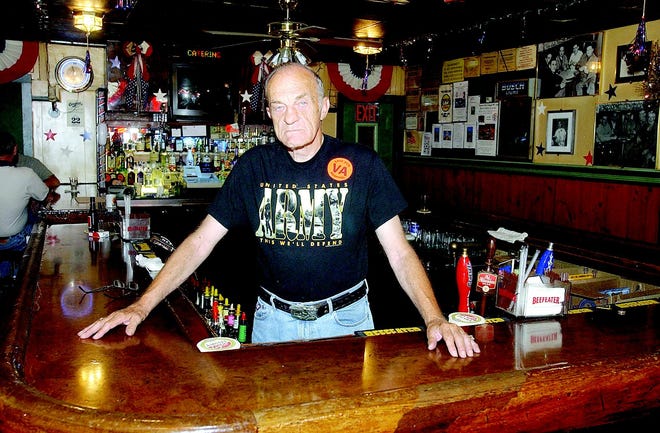 Fred Schutz is shown in the 1990s behind the bar he has operated for some 20 years on Phoenix Street in Canandaigua. Schutz, proud veteran and tireless advocate for those with calloused hands and blue collars, turns 80 today.