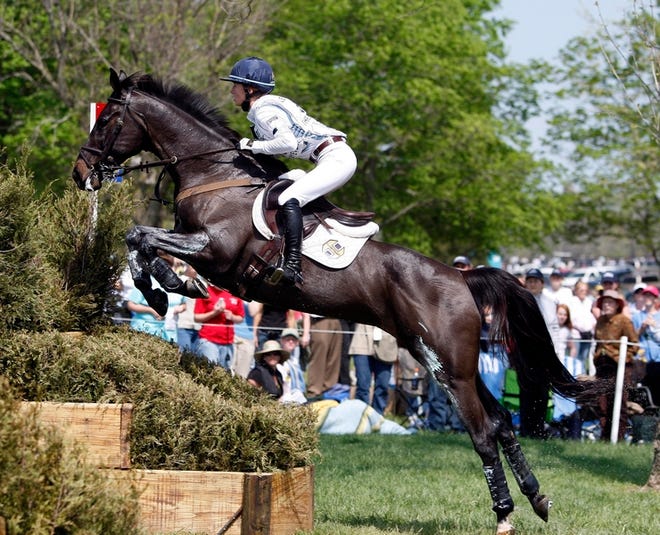 Jennifer Wooten successfully takes The Good Witch over a jump Saturday during the cross-country portion of the Rolex Kentucky Three-Day Event near Lexington, Ky.