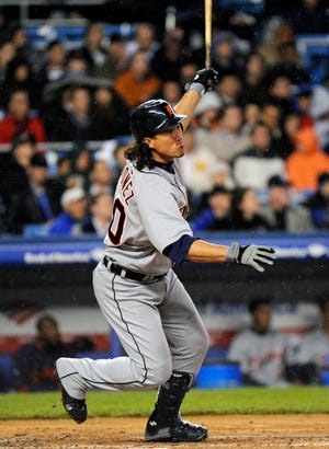 Detroit Tigers’ Magglio Ordonez follows through on a two-run double against the New York Yankees Thursday.