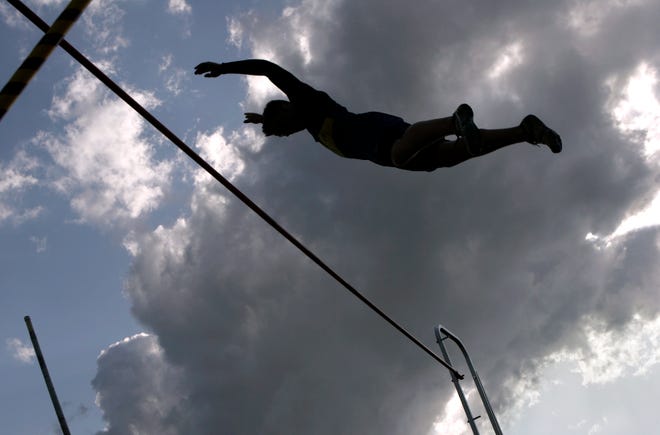 Hononegah High School's Gus Rothmaler clears the bar while competing in the pole vault May 2 during the Northern Illinois Invitational track and field meet at Hononegah High School in Rockton.