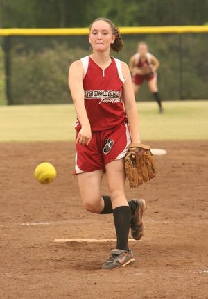 Brookwood’s Sarah Huggins delivers a pitch to a Rehobeth batter Saturday during their Class 5A sub-state game at Brookwood. Rehobeth swept the series, 11-1, 3-0, to eliminate Brookwood from the playoffs.