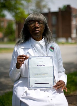 Lillie Lewis, 78, with a letter from Mississippi saying it had no record of her birth. “That’s downright wrong,” she said.