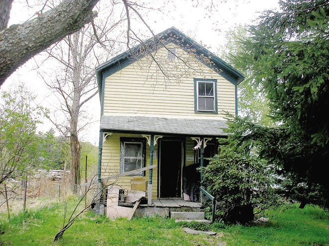 A grant program will help raze 22 blighted buildings and clean three roadsides in Sullivan County this year. The house shown here at 52 Pleasant St. in Livingston Manor is one of the buildings that will be torn down.