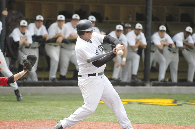 Adrian College senior Bobby Rickstad makes contact during an MIAA game this spring. Rickstad was named the league’s Most Valuable Position Player on Monday.