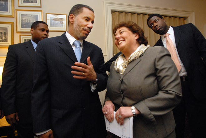 Gov. David Paterson, second from left, chats with Assemblywoman RoAnn Destito, D-Rome, Tuesday after speaking to about 500 members of the local business community at Hart's Hill Inn about his vision for New York State. "As the governor of this state, I will work to improve the quality of life for all the citizens of the state," Paterson said.