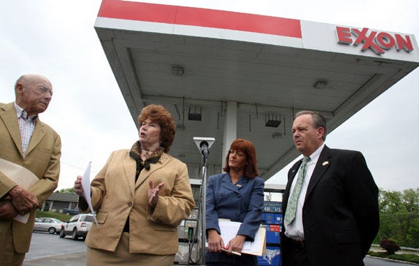 NY State Assemblywoman Nancy Calhoun, 2nd from left, speaks as fellow State Assembly members Tom Kirwan, left, Annie Rabbitt, 2nd from right, and Orange County Legislator Greg Townsend, right, listen during a press conference at the Goshen Exxon