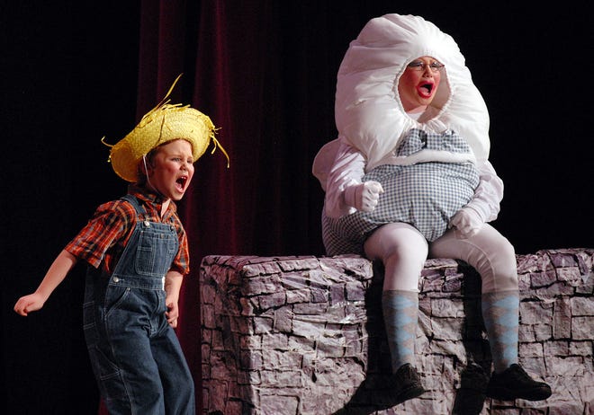 Siblings Angelo DiGiorgio, left, and Stacey DiGiorgio play Little Boy Blue and Humpty Dumpty respectively Sunday during the Albany Elementary School production of "Mother Goose and Company" during the "It's a Zoo!" Theater Competition Festival at the Stanley Center for the Arts in Utica.