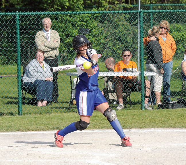 Lenawee Christian senior Maggie Hein connects for a double during Thursday’s doubleheader against Hudson. LCS beat Hudson by scores of 7-0 and 4-3.