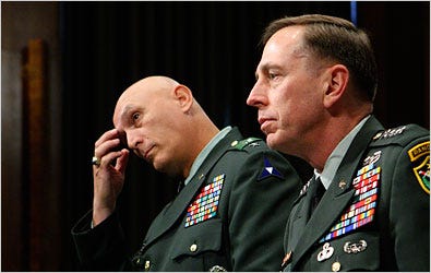 Gen. David H. Petraeus, right, and Lt. Gen. Raymond T. Odierno on Thursday in Washington.