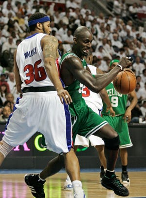 Boston Celtics forward Kevin Garnett drives around Detroit Pistons center Rasheed Wallace during the second quarter of Game 3 of the NBA Eastern Conference finals Saturday in Auburn Hills.