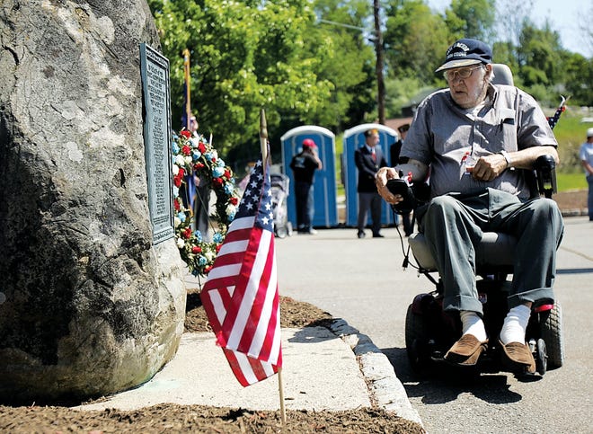 Photo By Daniel Freel/New Jersey Herald
Following NewtonÕs Memorial Day Parade on Monday, World War II Veteran Wesley Shaugher, of Newton, stops to read a memorial plaque for the fallen World War I soldiers from Sussex County during the Memorial Day services at Memory Park.