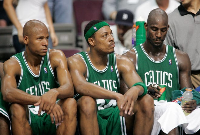 Boston Celtics' Ray Allen, left, Paul Pierce, center, and Kevin Garnett look on from the bench late in the fourth quarter of Game 4 of the NBA Eastern Conference basketball finals against the Detroit Pistons Monday, May 26, 2008, in Auburn Hills, Mich. Detroit won 94-75 to even the best-of-seven series at 2-2.