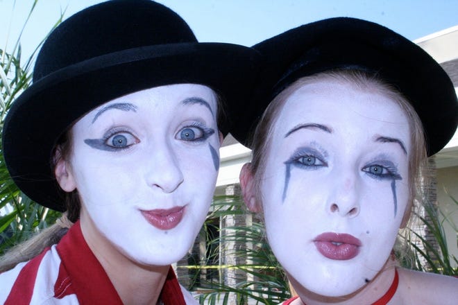 Alex Boden and Spencer L. Reeder circulated among guests at the Flavors of Munroe dinner May 8 as mimes. The theme of the evening was "Meet Me in Paris."