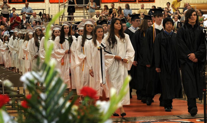 Marlborough High School seniors march in to commencement.