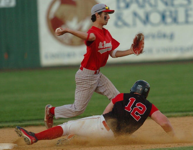 Cromwell’s Ryan McFarlin is forced out at second as St. Bernard’s Jeffrey Delucia throws to first Sunday to complete a double play in the fourth inning of their Class S quarterfinal in Mansfield. The Saints won, 2-1