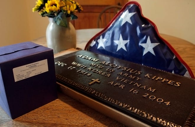 War veteran Adam Kippes's urn and plaque at his sister-in-law Carol Shedd's house in Natick