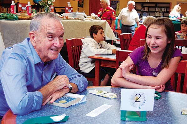 Kim Ledoux/Standard-Times special
Sixth-grader Kasey Pelletier and Ben Chauland talk during the fifth annual Literary Luncheon held May 30 at Freetown-Lakeville Middle School.