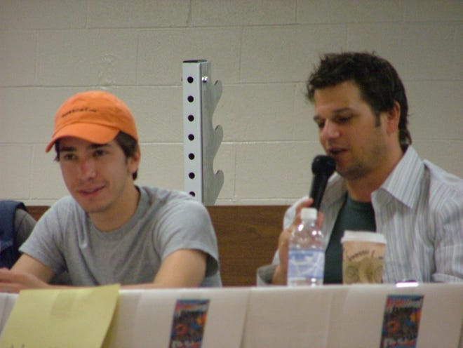 Actor Justin Long, left, and director Mark Kassen, speak during a panel discussion at the 2006 Waterfront Film Festival.