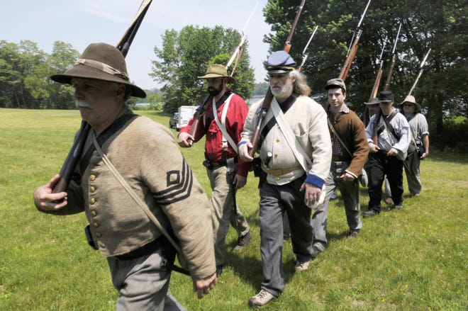 First Sgt. David Pincins leads the march of the 12th Georgia Volunteer Infantry Regiment Company F while preparing for next weekend's battle against the New England Brigade 25th Regiment.