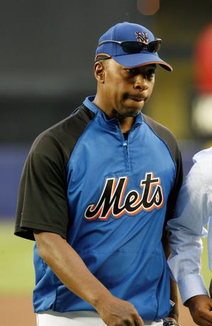 New York Mets manager Willie Randolph purses his lips as he leaves the field following batting practice before the Mets baseball game at Shea Stadium in New York, Tuesday, May 27, 2008. (AP Photo/Kathy Willens)