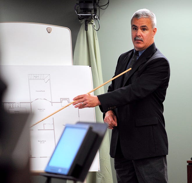Hopkinton police Sgt. Michael Sutton points to a floor plan of the 6 Cubs Path home of Neil Entwistle. Entwistle, born in England, is charged with first-degree murder in the death of his wife, Rachel, and infant daughter, Lillian, in their home in January 2006. 

testifies about finding the bodies of Rachel and Lillian Entwistle in in January 2006.